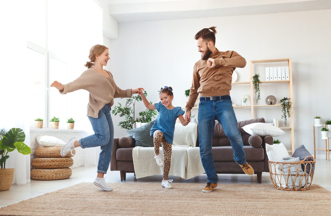 a family playing together indoors
