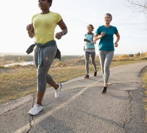a group of people running outdoors