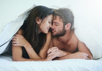 couple embracing in bed