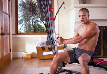 a man working out on his bowflex