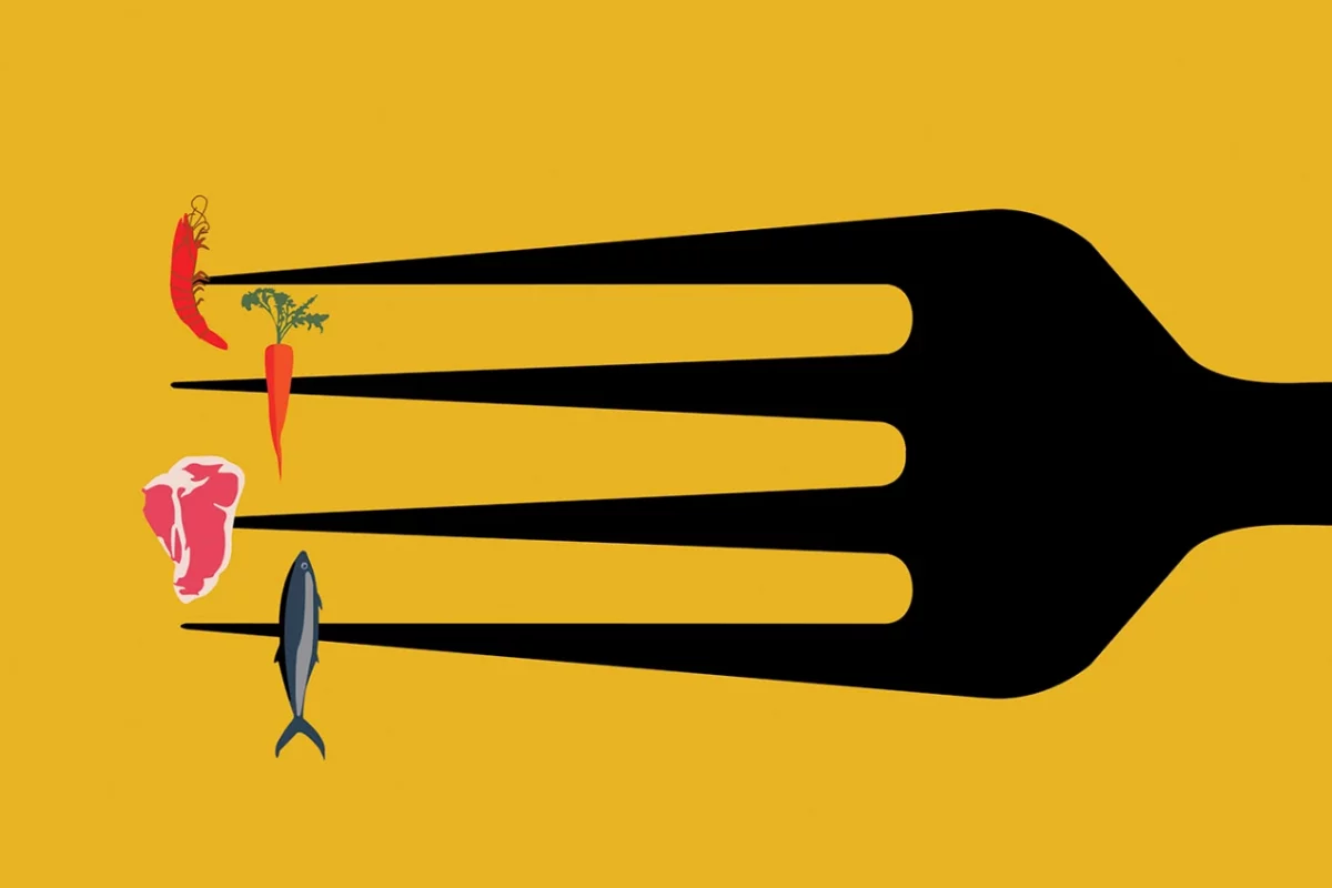 a fork with images of different foods on it.