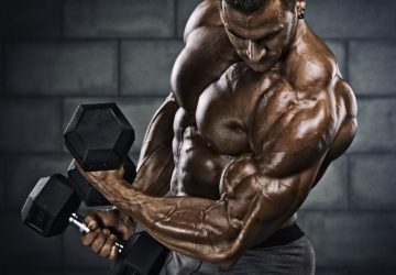 a muscular man lifting weights