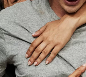 a woman holding a man