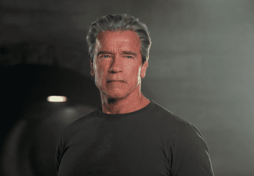 arnold schwarzeneger training his arms