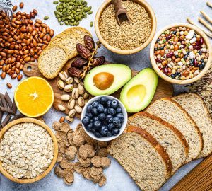 a table filled with an assortment of high fiber foods