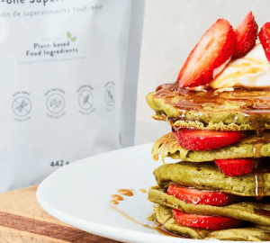 a pile of matcha pancakes on a plate